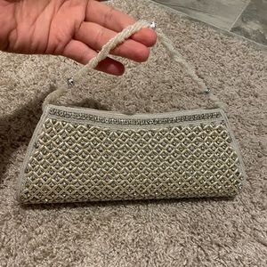Heavy pearl and stone work clutch
